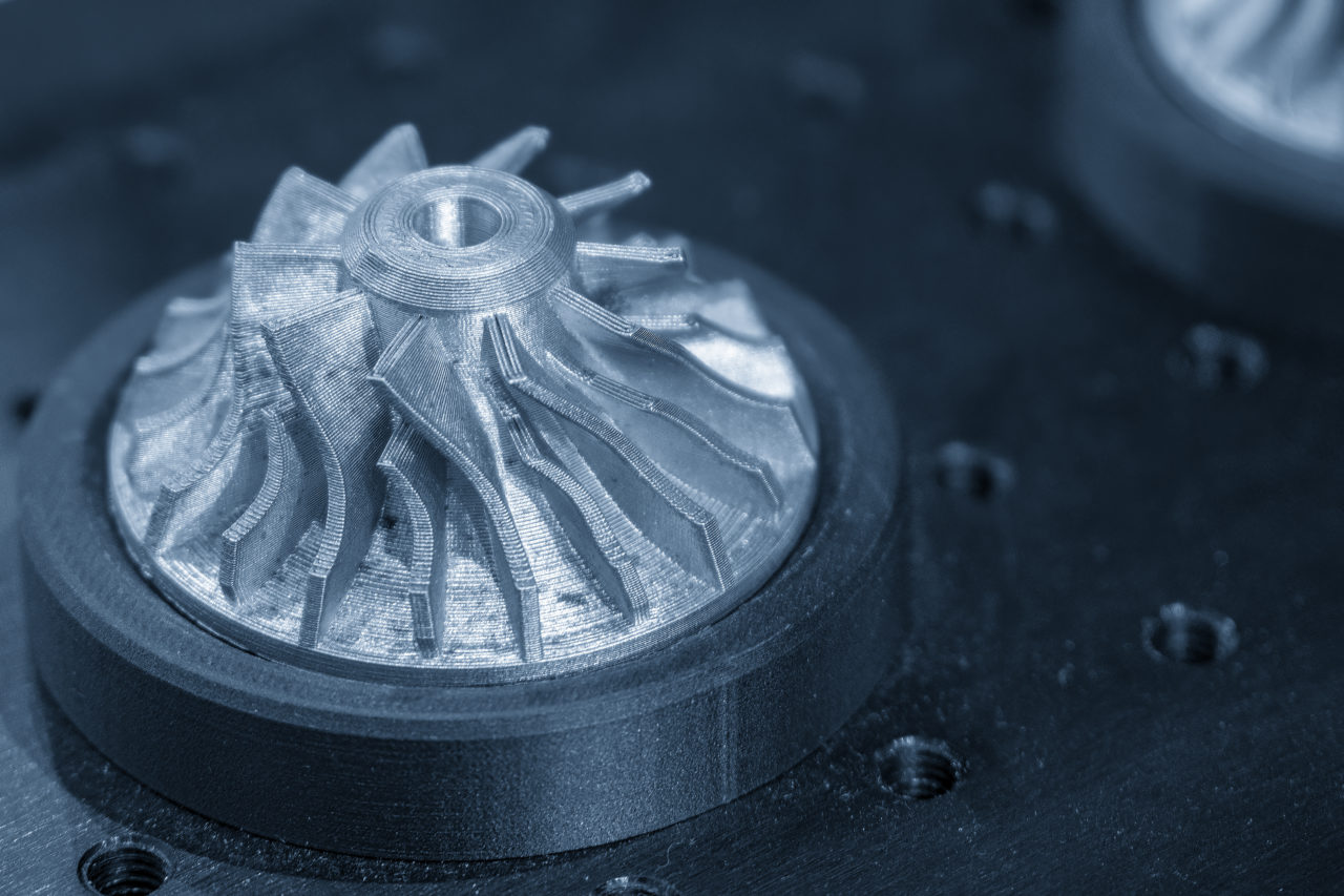 The turbine parts form metal 3D printing process in the light.